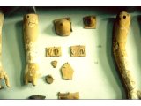 Corinth - Asklepian Temple - votive offerings in the shape of the limb the supplicant wants healing for.